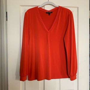 Banana Republic M reddish orange stretchy crepe top.